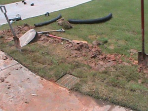 Surface Drain installed on the edge of a sidewalk in Edmond