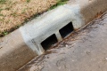 Double Curb Outlet For French Drain Installed In Norman Oklahoma